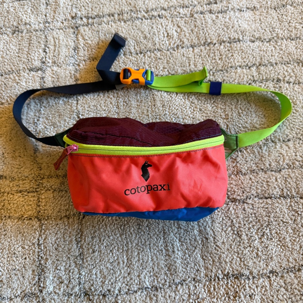 Cotopaxi Fanny Pack, Hip Bag, Waist Pack with neon orange and Blue